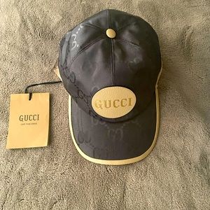 Authentic Gucci hat. Snaps on adjustable. Tag included M 58cm